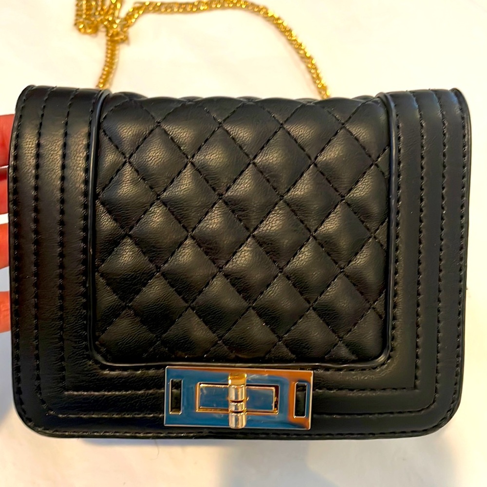 Olivia Miller black small crossbody bag.